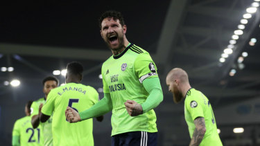 Sean Morrison celebrates his goal for Cardiff.