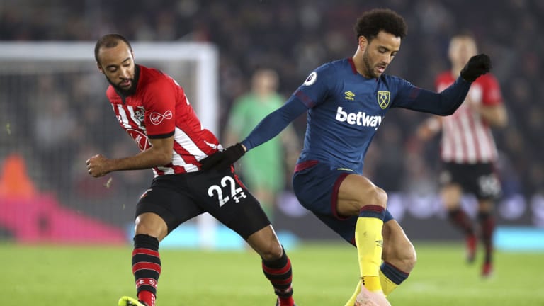 Show stopper: Felipe Anderson (right) secured all three points for the Hammers.