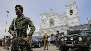 Sri Lankan Army soldiers secure the area around St. Anthony's Shrine after a blast in Colombo.