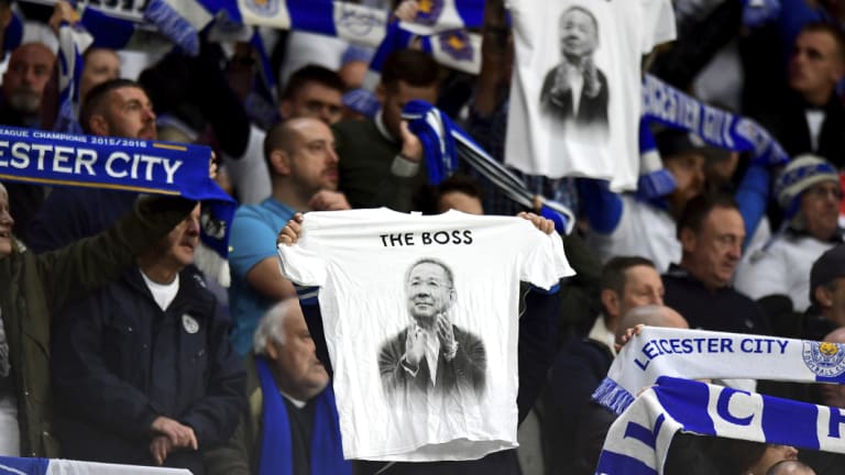 Leicester City fans hold up shirts in remembrance of Vichai Srivaddhanaprabha during the victory over Cardiff.