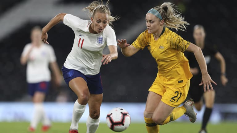 England's Toni Duggan and Australia's Ellie Carpenter at Craven Cottage.