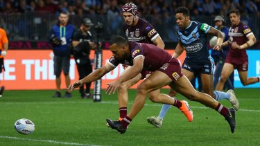 Close call: Will Chambers just fails to get to the ball before crossing the dead-ball line after being impeded by Jack Wighton.