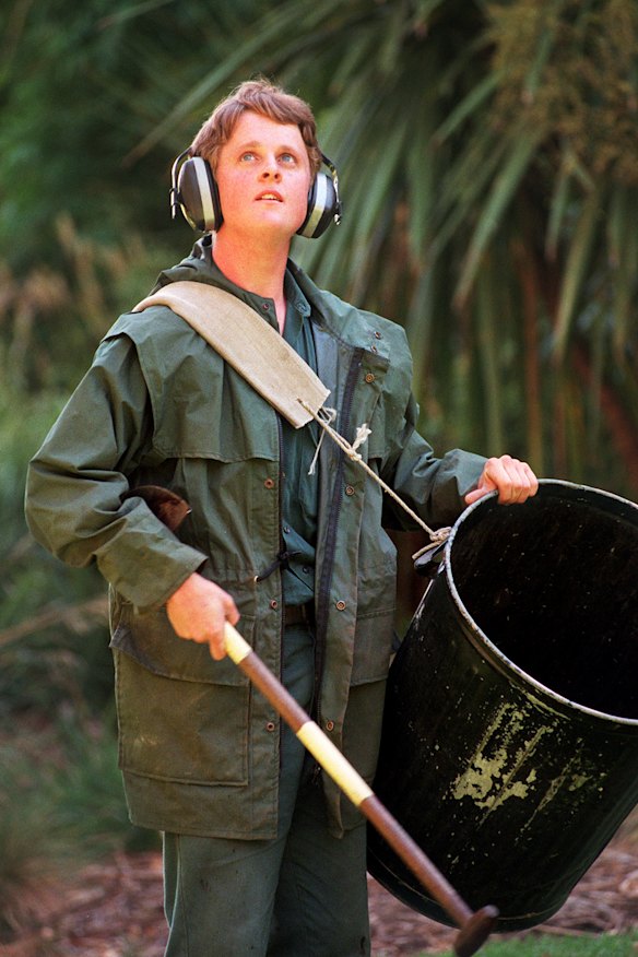 Travers Carrol with a bin, about to scare some bats.