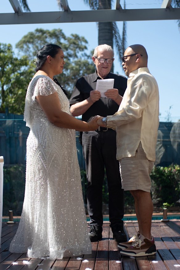 Crews officiating at Billedo’s wedding in 2023.