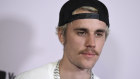 Justin Bieber, who once sang made-up songs about Canadian fast food chain Tim Hortons, now collaborates with the company.