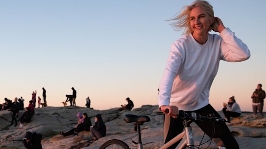 On Friday, Genevieve Quigley watches the sun rise in Maroubra as she marks one year off the booze. 
