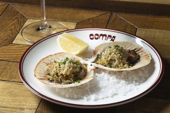 Abrolhos Island scallops are bathed in herb butter.