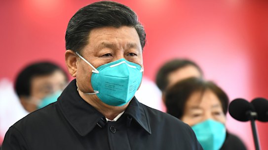 Xi Jinping speaks to hospital workers via video in Wuhan during the first outbreak of the virus. 