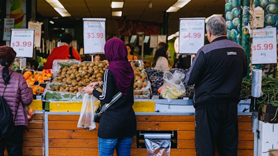 Looking for a bargain. Consumer spending is slowing as inflation and interest rates hit shoppers.
