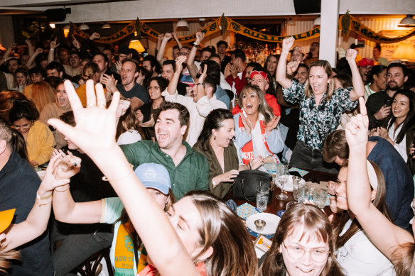 Crowd watching a nail-biting Matildas game at The Clock Surry Hills.