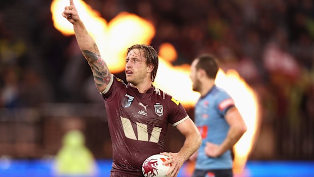 Queensland captain Cameron Munster celebrates victory at full-time.