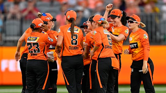 The Scorchers celebrate in Perth. 
