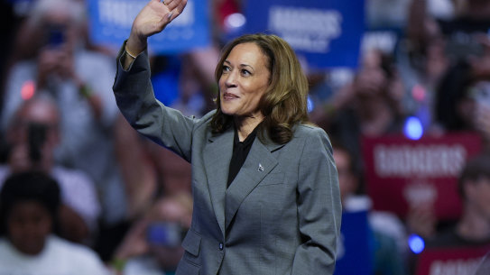 Democratic presidential nominee Vice President Kamala Harris waves to supporters at a campaign event Friday.