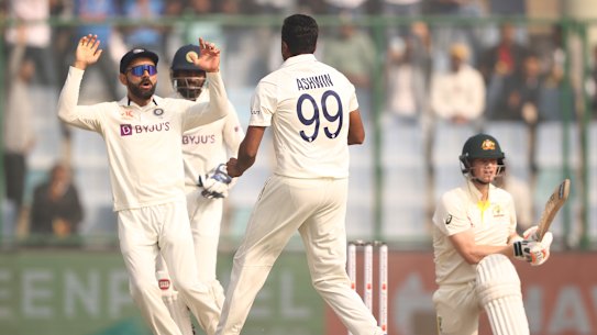 India’s Ravi Ashwin celebrates taking the wicket of Australia’s Steve Smith during a calamitous day three of the second Test in Delhi.