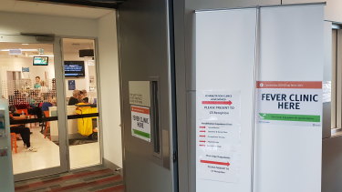 Signage points to the clinic set up at the Gold Coast University Hospital as Queensland ramps up efforts to counter coronavirus.