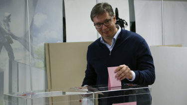 Serbia's President Aleksandar Vucic casts his ballot in Belgrade.