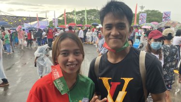 Michelle Jane Talaboc with Mike Joy Leonar, both 20, turned out to see Marcos in Mindinao.