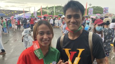 Michelle Jane Talaboc with Mike Joy Leonar, both 20, turn out to see Marcos in Mindinao.