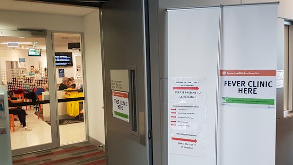 Signage points to the clinic set up at the Gold Coast University Hospital as Queensland ramps up efforts to counter coronavirus.