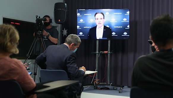 Federal Health Minister Greg Hunt at a press conference. 