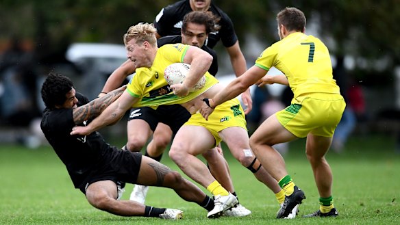 Lachlan Miller grapples with the New Zealand defence.