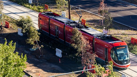 Light rail on Northbourne Avenue. Public servants are under pressure to put in long hours ahead of the launch later this month. 