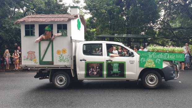 A Leprechaun greeting the crowd.