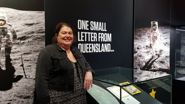 Shelley Roshanbin with her letter on display at the Queensland Museum's NASA exhibition.