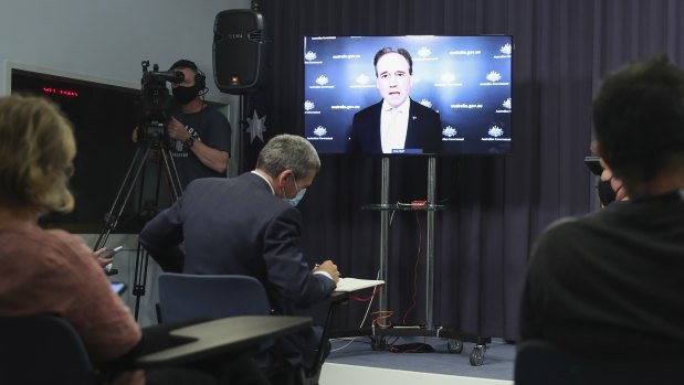 Federal Health Minister Greg Hunt at a press conference. 