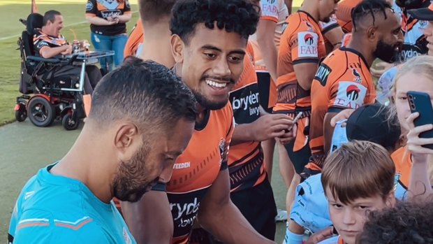 Jahream Bula and coach Benji Marshall mingle with fans on Thursday at Campbelltown on Thursday.