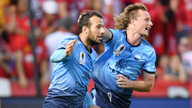 Fearless: Sydney FC striker Adam Le Fondre, left, says Thursday's win over Perth proves his side are a title threat in the finals series. 