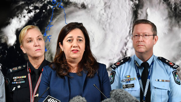 Fire and Emergency Services Commissioner Katarina Carroll (left), Premier Annastacia Palaszczuk (centre) and Police Deputy Commissioner Bob Gee (right) at Disaster Management Committee meeting on Tuesday.