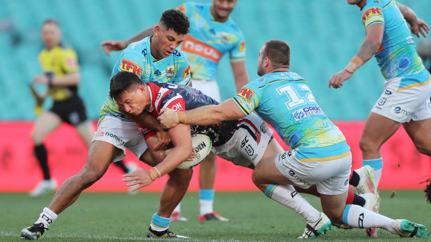 Joseph Manu goes over for the Roosters.
