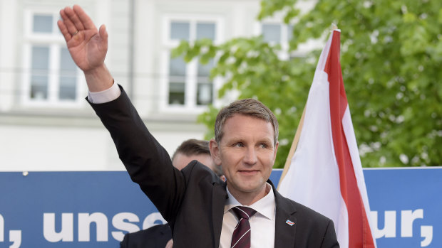 Bjorn Hocke waves during a nationalist Alternative for Germany rally in 2016.