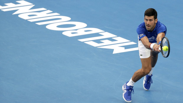 The iconic blue-cushioned acrylic hardcourt will remain, Tennis Australia insists. 