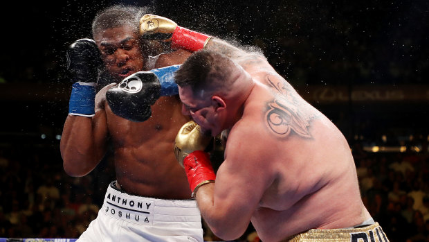 Andy Ruiz Jr  connects with Anthony Joshua in their IBF/WBA/WBO heavyweight title fight at Madison Square Garden in June.`