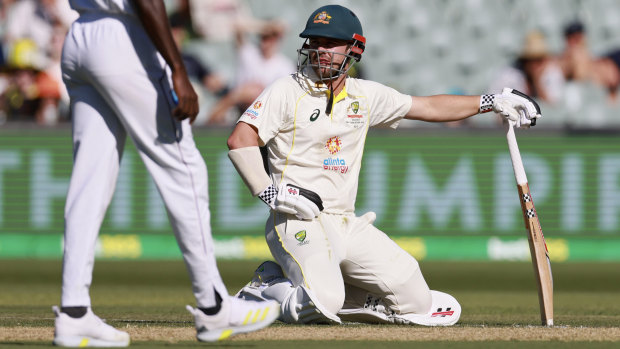 Frustration. Travis Head kneels on the ground after he is run out.