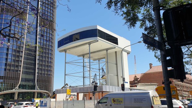 Queen's Wharf Residences display suite has been lifted five storeys in the air in Brisbane's CBD.