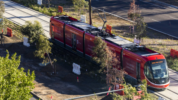 Light rail on Northbourne Avenue. Public servants are under pressure to put in long hours ahead of the launch later this month. 