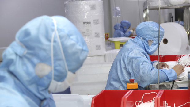 Workers in Jiangsu province. The deal links Victorian businesses and universities with Chinese counterparts in the province.
