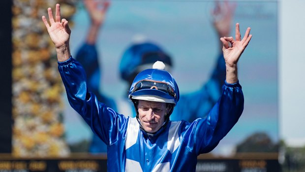 Drawcard: Hugh Bowman celebrates at Randwick.