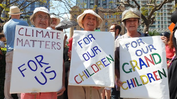Sisters Margaret Banks, Kath Harper and Isobel Harvey attend the Brisbane climate strike rally.