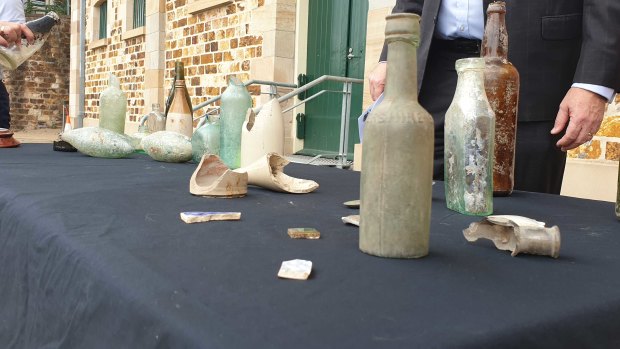 Artefacts from early Brisbane found at the $3.6 billion Queen's Wharf Brisbane development site, presented in front of the Commissariat Store and preserved by the project team. 