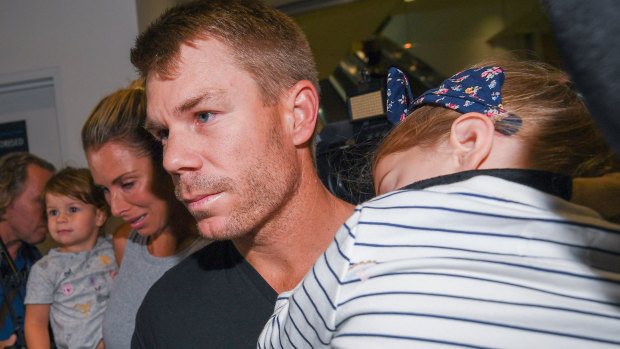 David Warner, wife Candice and their children arrive at Sydney Airport on Thursday.