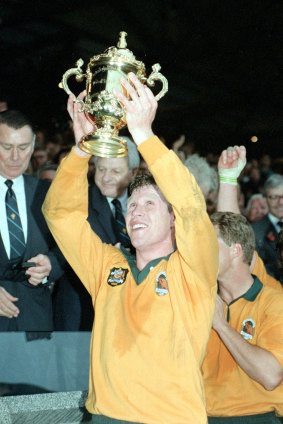 Nick Farr-Jones celebrates with the Webb Ellis Cup at Twickenham in 1991.