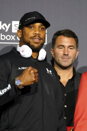 British promoter Eddie Hearn, right, also manages former unified world  heavyweight champion Anthony Joshua, one of Huni’s idols.