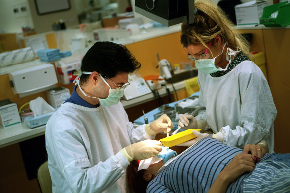 Dentists working at Westmead Hospital before the coronavirus.    