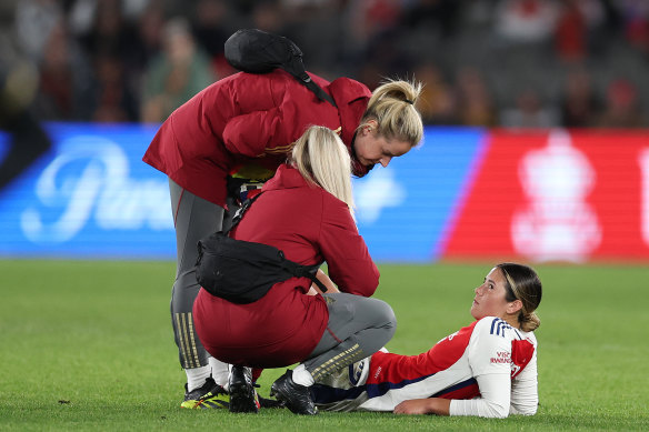 Arsenal’s trainers tend to Kyra Cooney-Cross gets treatment.