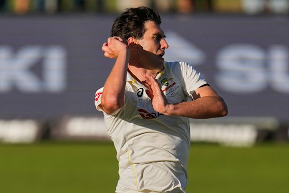 Australia’s captain Pat Cummins bowls on day two.