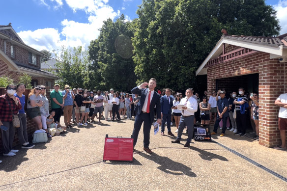 Auctioneer Stu Benson took offers from 10 of the 44 registered bidders. 